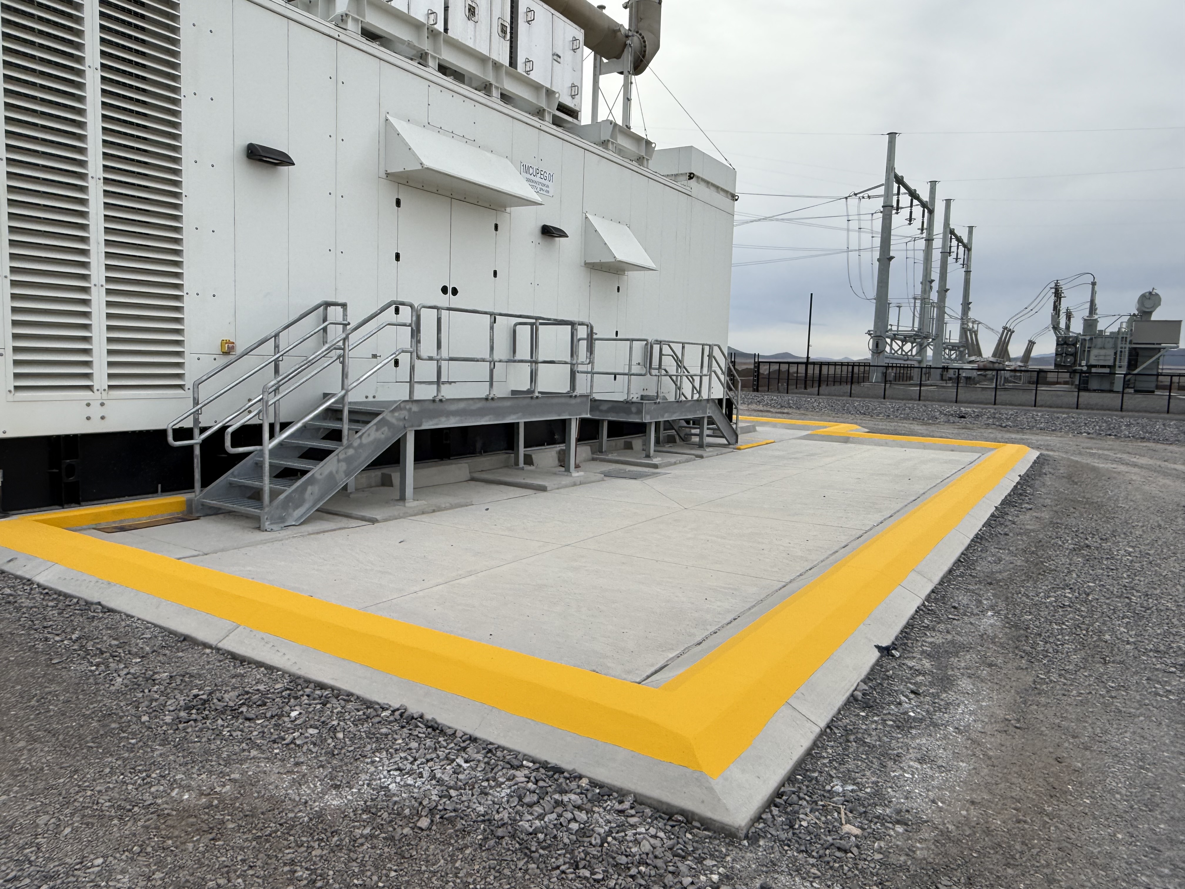 Fresh yellow curb and perimeter safety marking