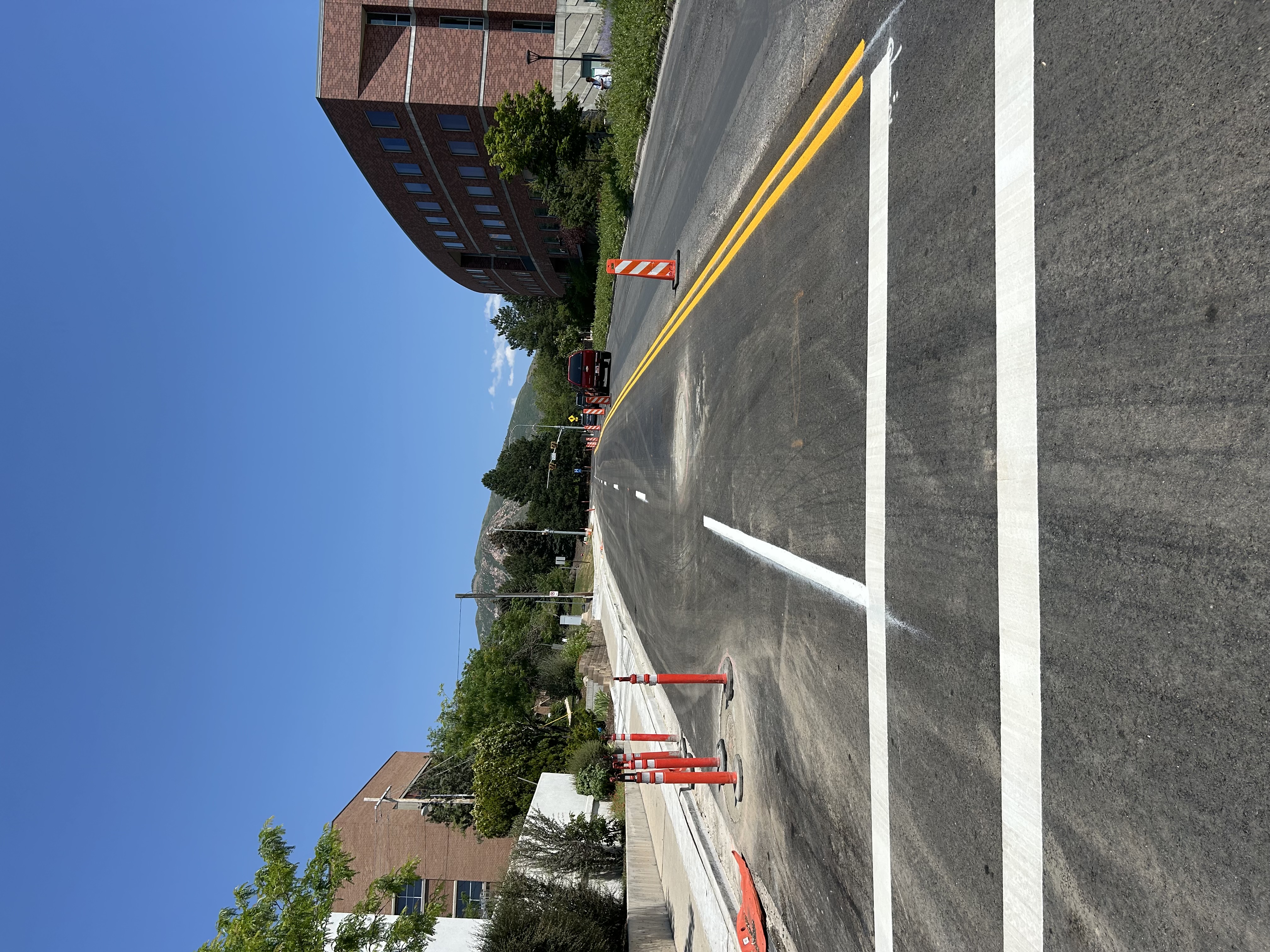 Fresh roadway striping on a paved street
